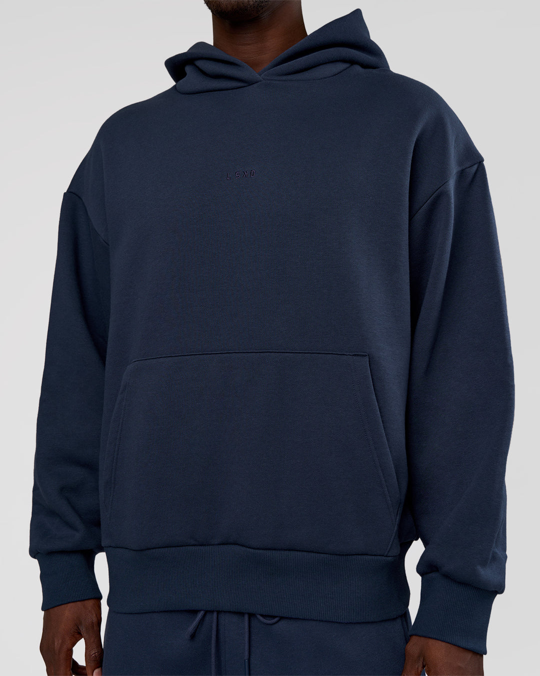 Man wearing MVP Oversized Hoodie - Future Navy | Model:Okello | Size:M - view 9
