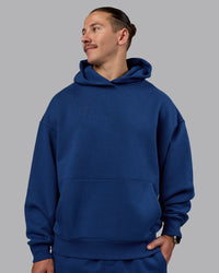 Man wearing MVP Oversized Hoodie - Midnight Blue | Model:Jaiden | Size:M | Thumbnail Index: 1