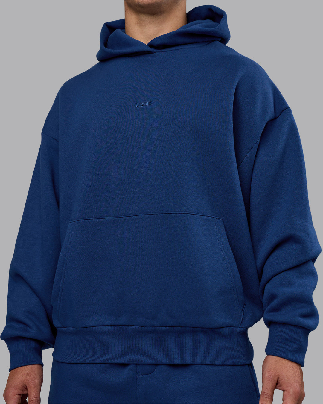 Man wearing MVP Oversized Hoodie - Midnight Blue | Model:Jaiden | Size:M - view 10