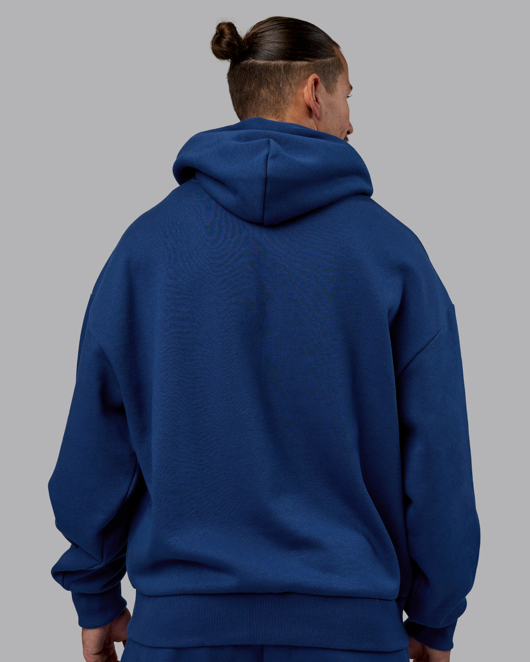 Man wearing MVP Oversized Hoodie - Midnight Blue | Model:Jaiden | Size:M - view 4