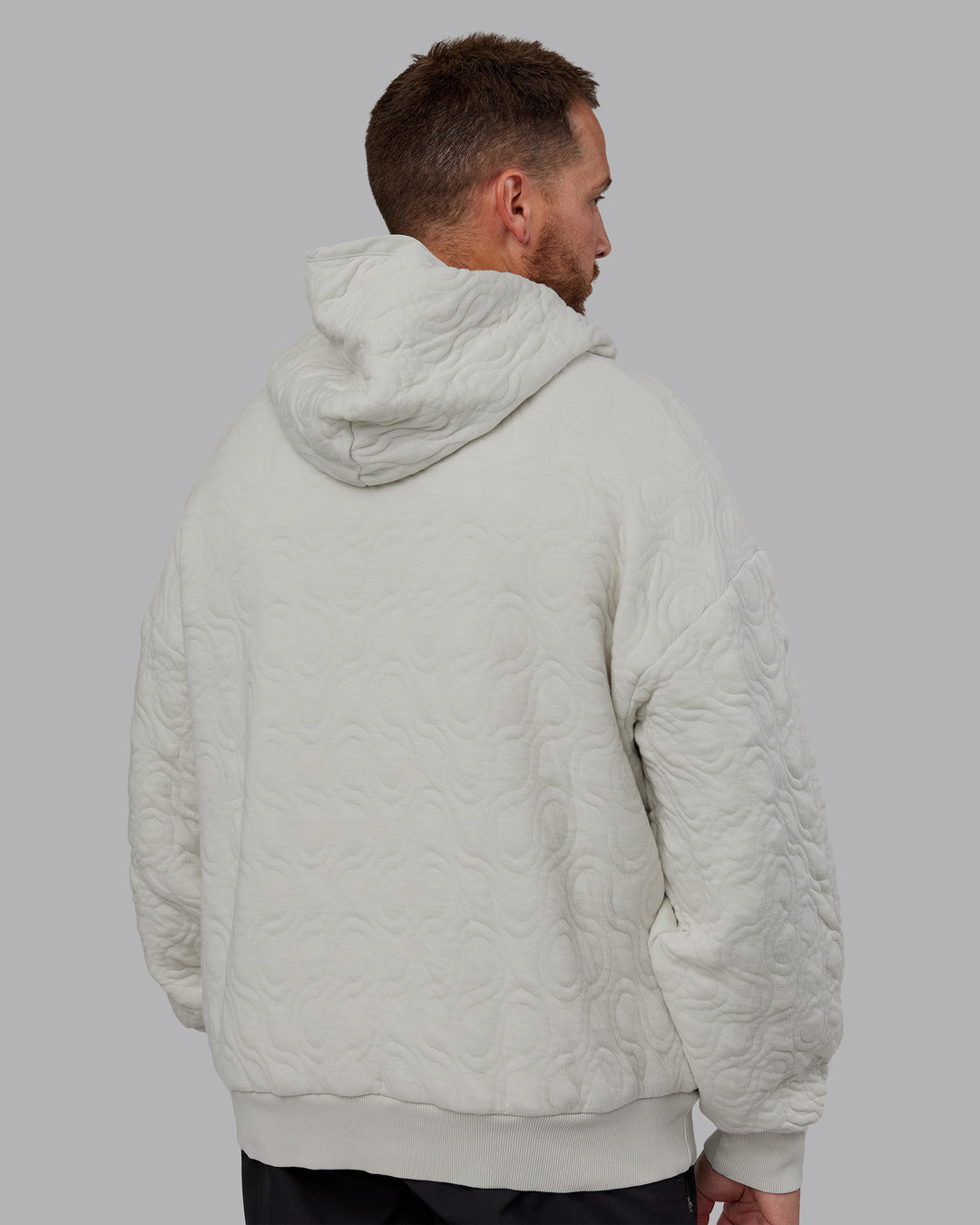Man wearing MVP Quilted Oversized Hoodie in Digital Mist-Geometric | Model:Macca | Size:M - view 7
