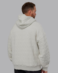 Man wearing MVP Quilted Oversized Hoodie in Digital Mist-Geometric | Model:Macca | Size:M | Thumbnail Index: 6