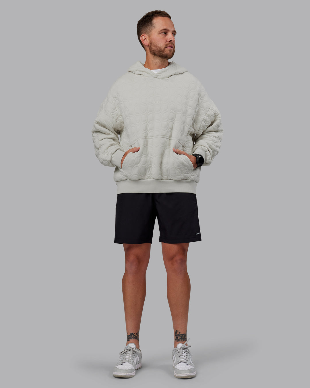 Man wearing MVP Quilted Oversized Hoodie - Digital Mist-Geometric | Model:Macca | Size:M - view 11