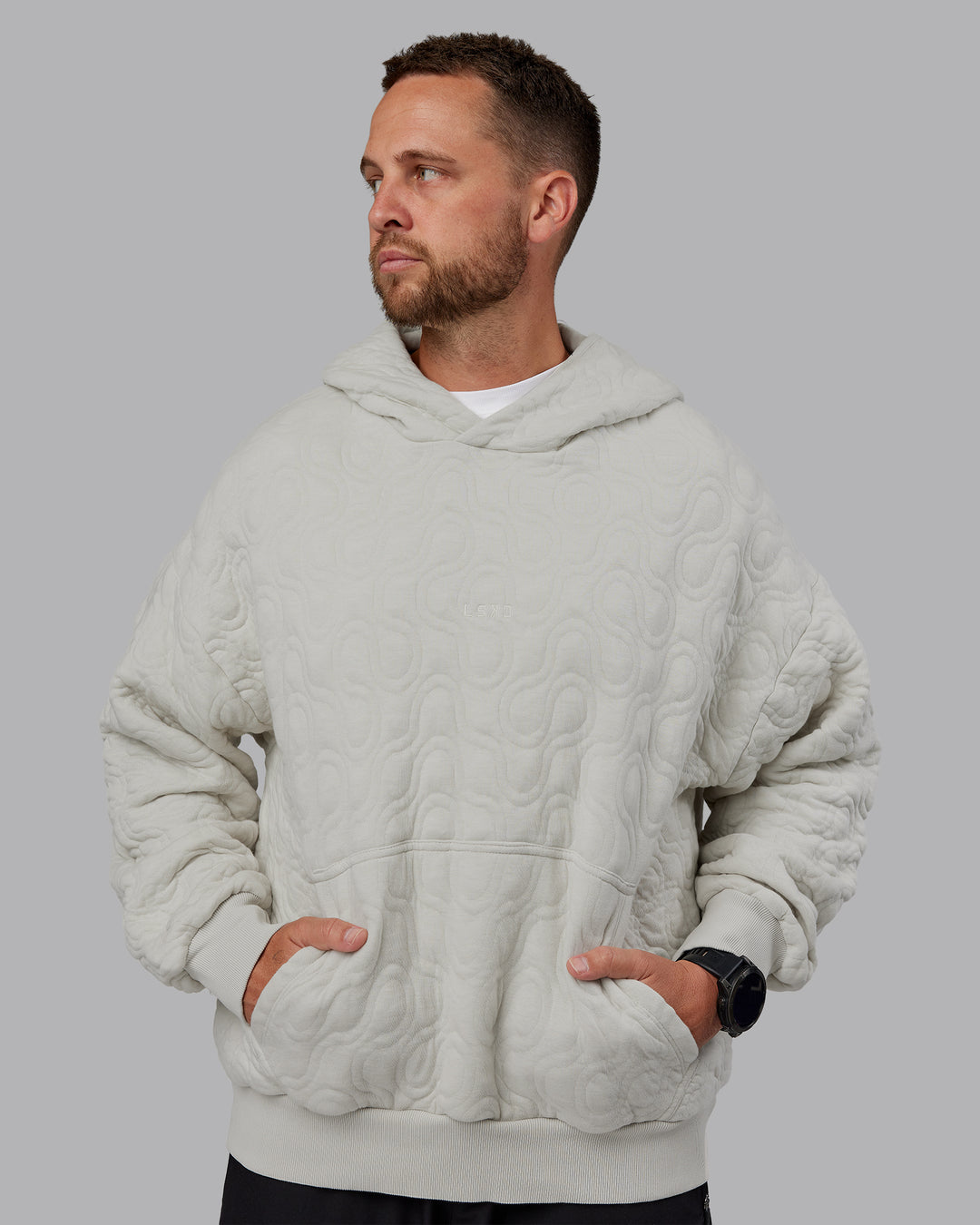 Man wearing MVP Quilted Oversized Hoodie in Digital Mist-Geometric | Model:Macca | Size:M - view 5