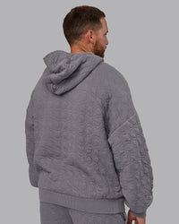 Man wearing MVP Quilted Oversized Hoodie - Storm Front-Geometric | Model:Macca | Size:M | Thumbnail Index: 3