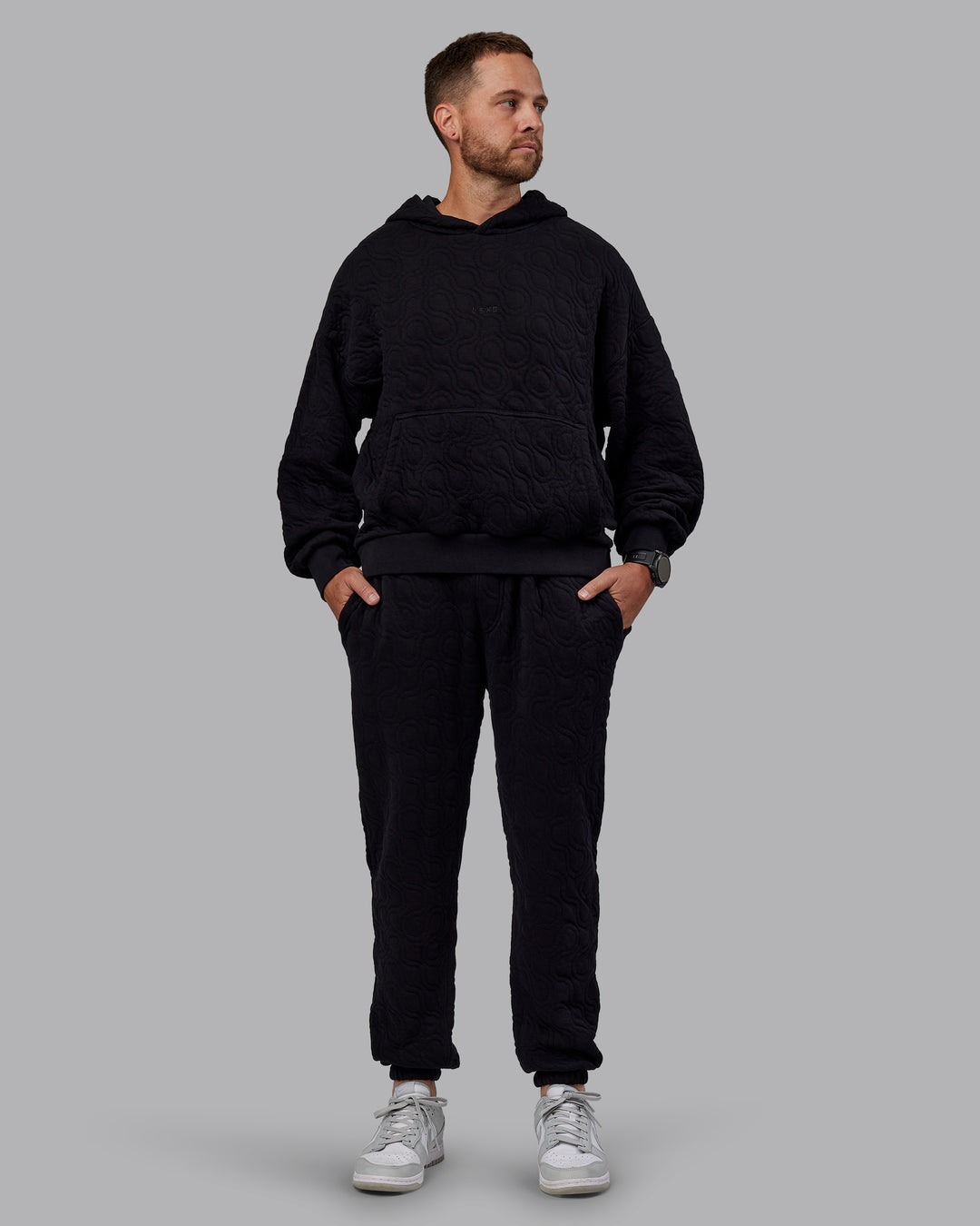 Man wearing MVP Quilted Track Pant - Black-Geometric | Model:Macca | SIze:M - view 9