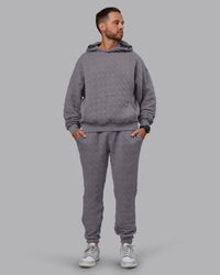 Man wearing MVP Quilted Track Pant - Storm Front-Geometric | Model:Macca | Size:M | Thumbnail Index: 14
