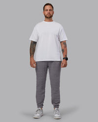Man wearing MVP Quilted Track Pant - Storm Front-Geometric | Model:Macca | Size:M | Thumbnail Index: 8