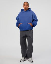 Man wearing Memory In Motion Ultra Heavyweight Washed Hoodie - Electric Indigo Washed | Model:Malebo | Size:M | Thumbnail Index: 9