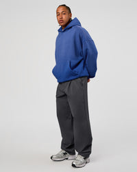 Man wearing Memory In Motion Ultra Heavyweight Washed Hoodie - Electric Indigo Washed | Model:Malebo | Size:M | Thumbnail Index: 5