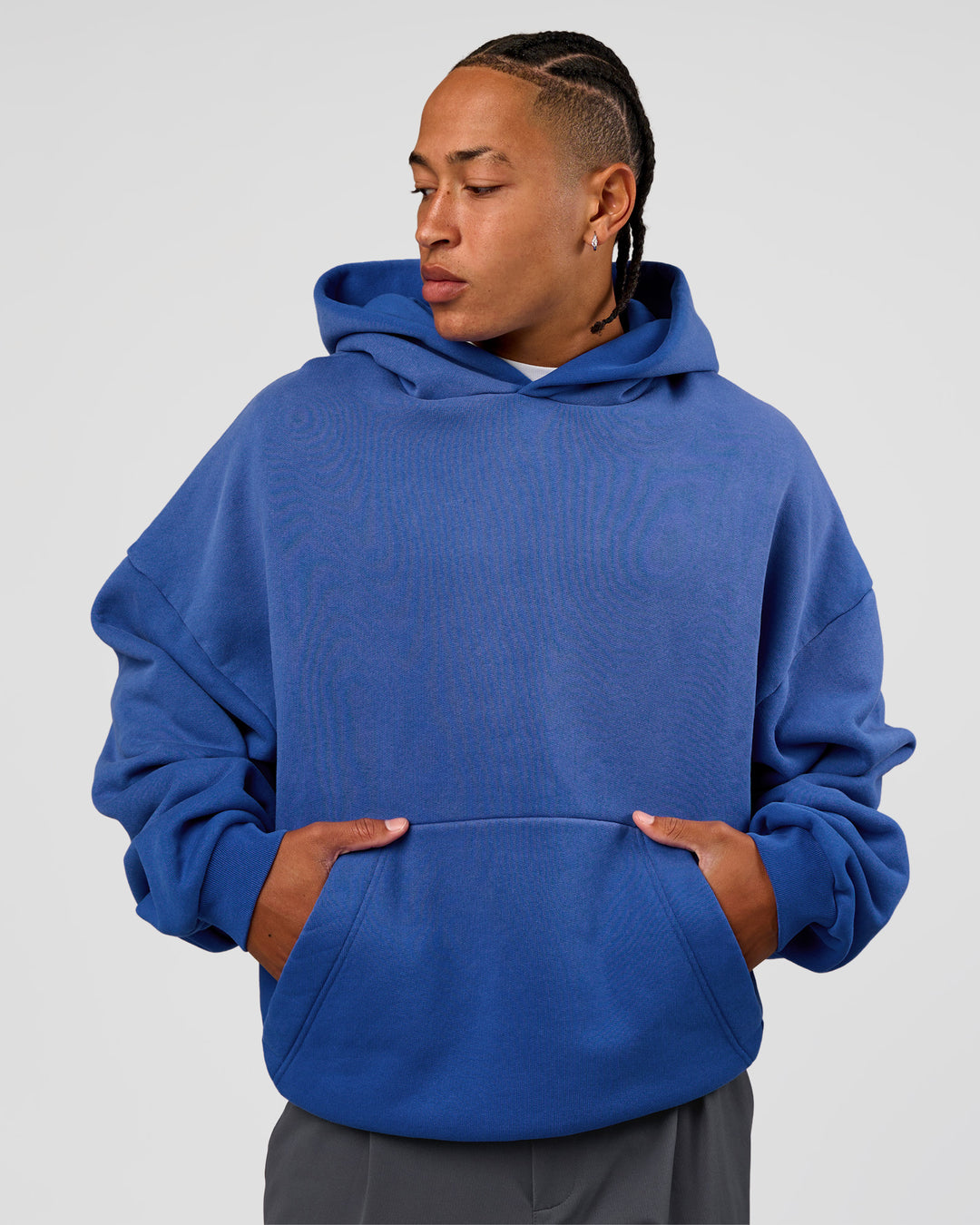 Man wearing Memory In Motion Ultra Heavyweight Washed Hoodie - Electric Indigo Washed | Model:Malebo | Size:M - view 2