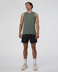 Man wearing AeroFLX+ Seamless Muscle Tank - Graphite/Graphite | Model:Konnor | Size:M | Thumbnail Index: 3
