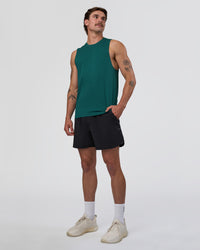 Man wearing AeroFLX+ Seamless Muscle Tank - Transformative Teal/Transformative Teal | Model:Konnor | Size:M | Thumbnail Index: 3