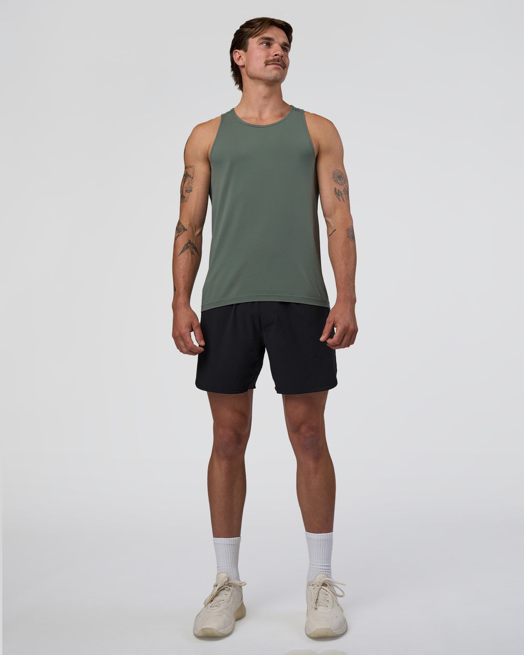 Man wearing AeroFLX+ Seamless Tank - Graphite/Graphite | Model:Konnor | Size:M - view 3