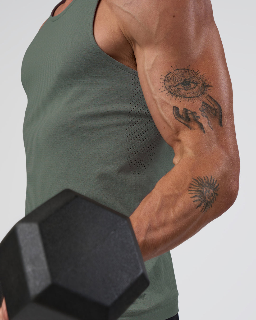 Man wearing AeroFLX+ Seamless Tank - Graphite/Graphite | Model:Konnor | Size:M - view 2