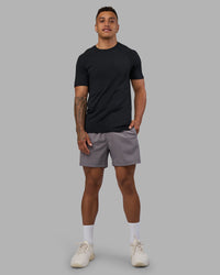 Man wearing AeroFLX+ Seamless Tee - Black Marl | Model:Daarian | Size:M | Thumbnail Index: 4