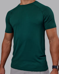 Man wearing AeroFLX+ Seamless Tee - Dark Moss/Dark Moss | Model:Jaiden | Size:M | Thumbnail Index: 6