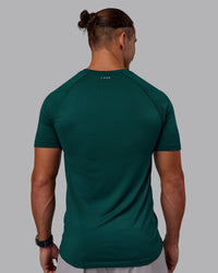 Man wearing AeroFLX+ Seamless Tee - Dark Moss/Dark Moss | Model:Jaiden | Size:M | Thumbnail Index: 3