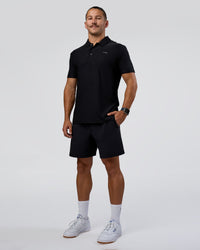 Man wearing Drive Polo - Black | Model:Jaiden | Size:M | Thumbnail Index: 4