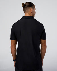 Man wearing Drive Polo - Black | Model:Jaiden | Size:M | Thumbnail Index: 3