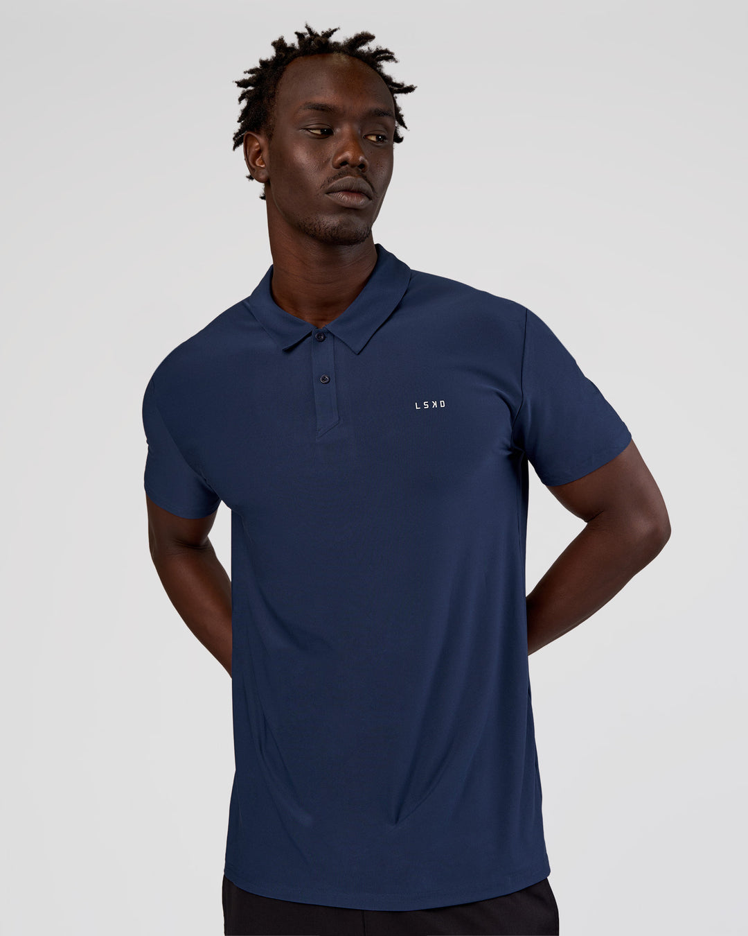 Man wearing Drive Polo - Future Navy | Model:Okello | Size:M - view 1