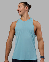 Man wearing Pace Running Tank - Retro Blue | Model:Jaiden | Size:M | Thumbnail Index: 0