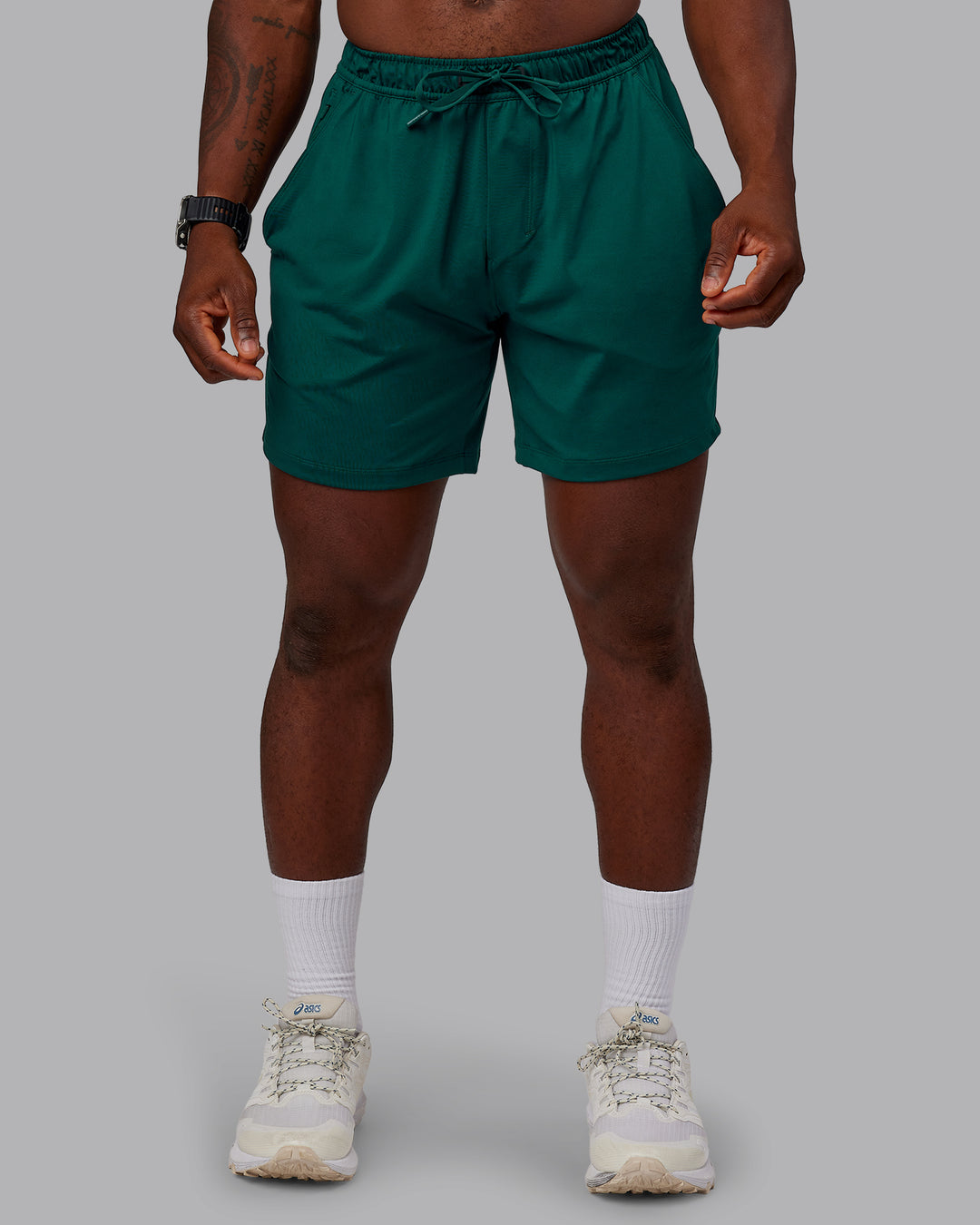 Man wearing Restore CloudFLX Short in Dark Moss | Size:M | Model:Sam - view 1