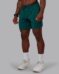 Man wearing Restore CloudFLX Short in Dark Moss | Size:M | Model:Sam | Thumbnail Index: 5