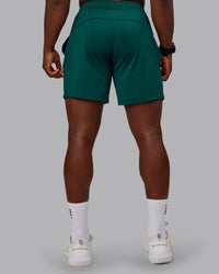 Man wearing Restore CloudFLX Short in Dark Moss | Size:M | Model:Sam | Thumbnail Index: 3