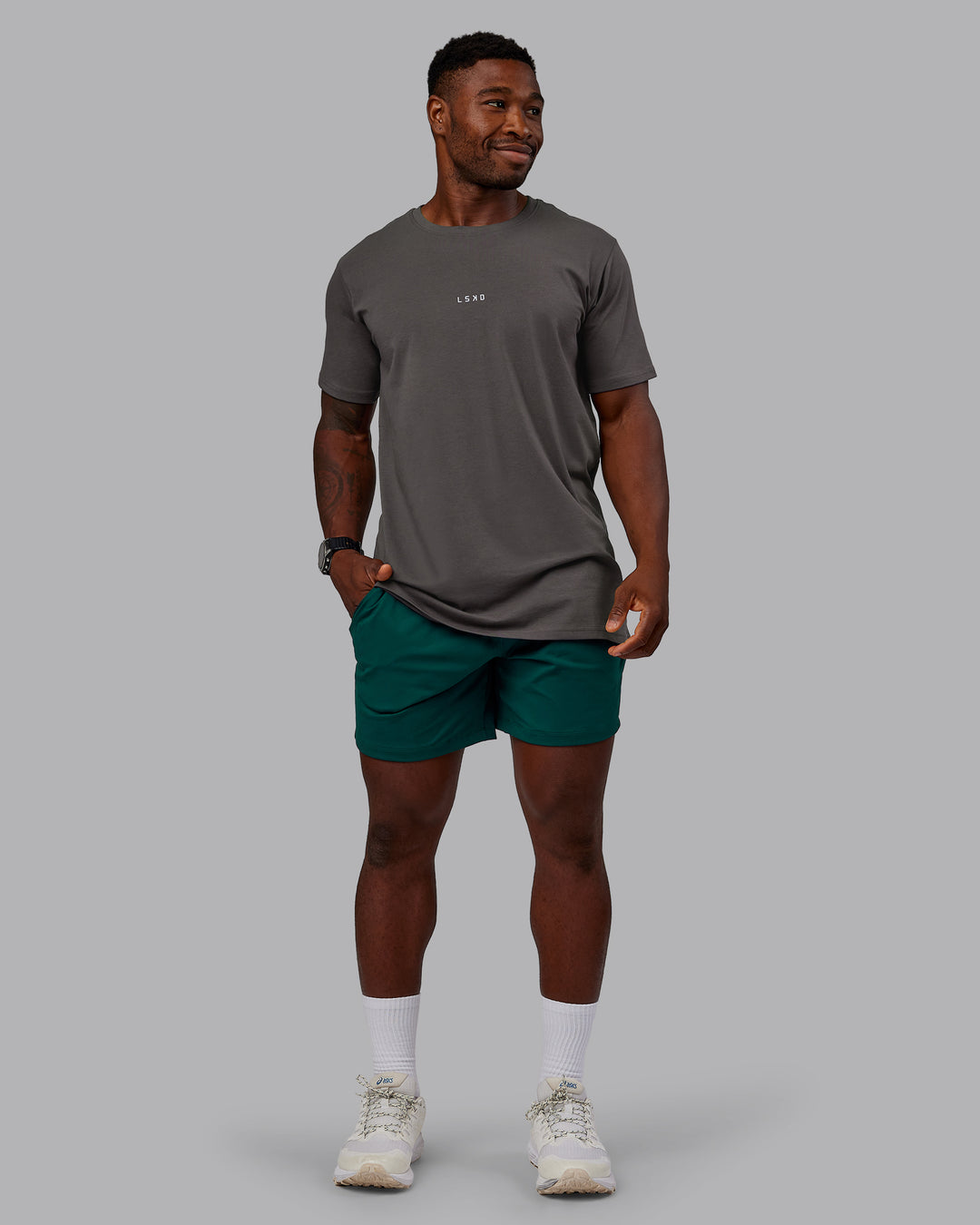 Man wearing Restore CloudFLX Short in Dark Moss | Size:M | Model:Sam - view 5