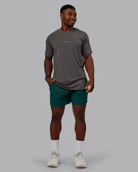 Man wearing Restore CloudFLX Short in Dark Moss | Size:M | Model:Sam | Thumbnail Index: 4