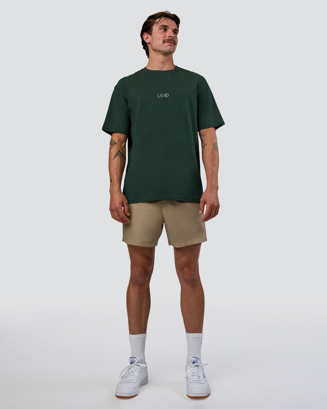 Man wearing Merry Journey FLXCotton Oversized Tee - Vital Green-White | Model:Konnor | Size:M - view 11