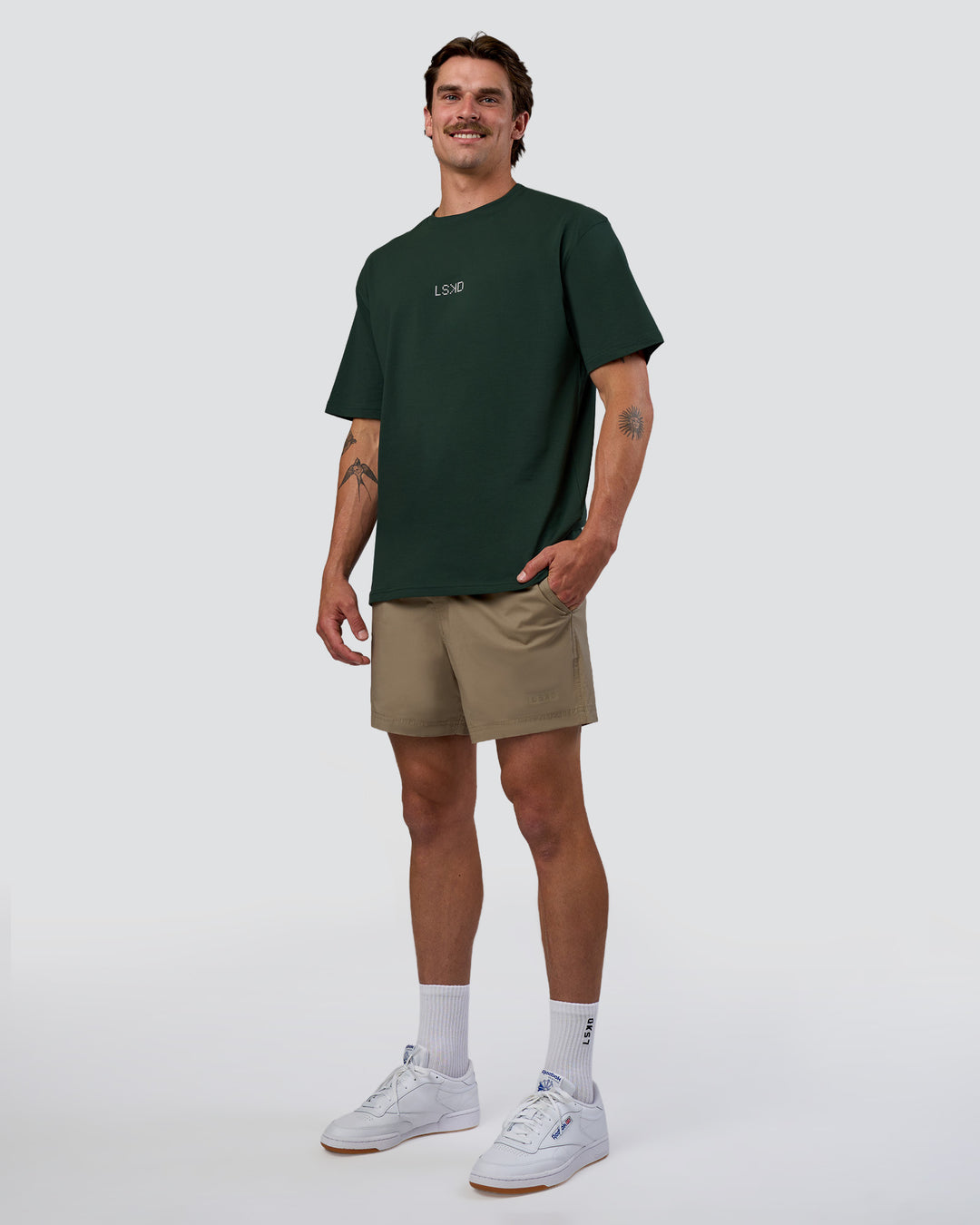 Man wearing Merry Journey FLXCotton Oversized Tee - Vital Green-White | Model:Konnor | Size:M - view 7