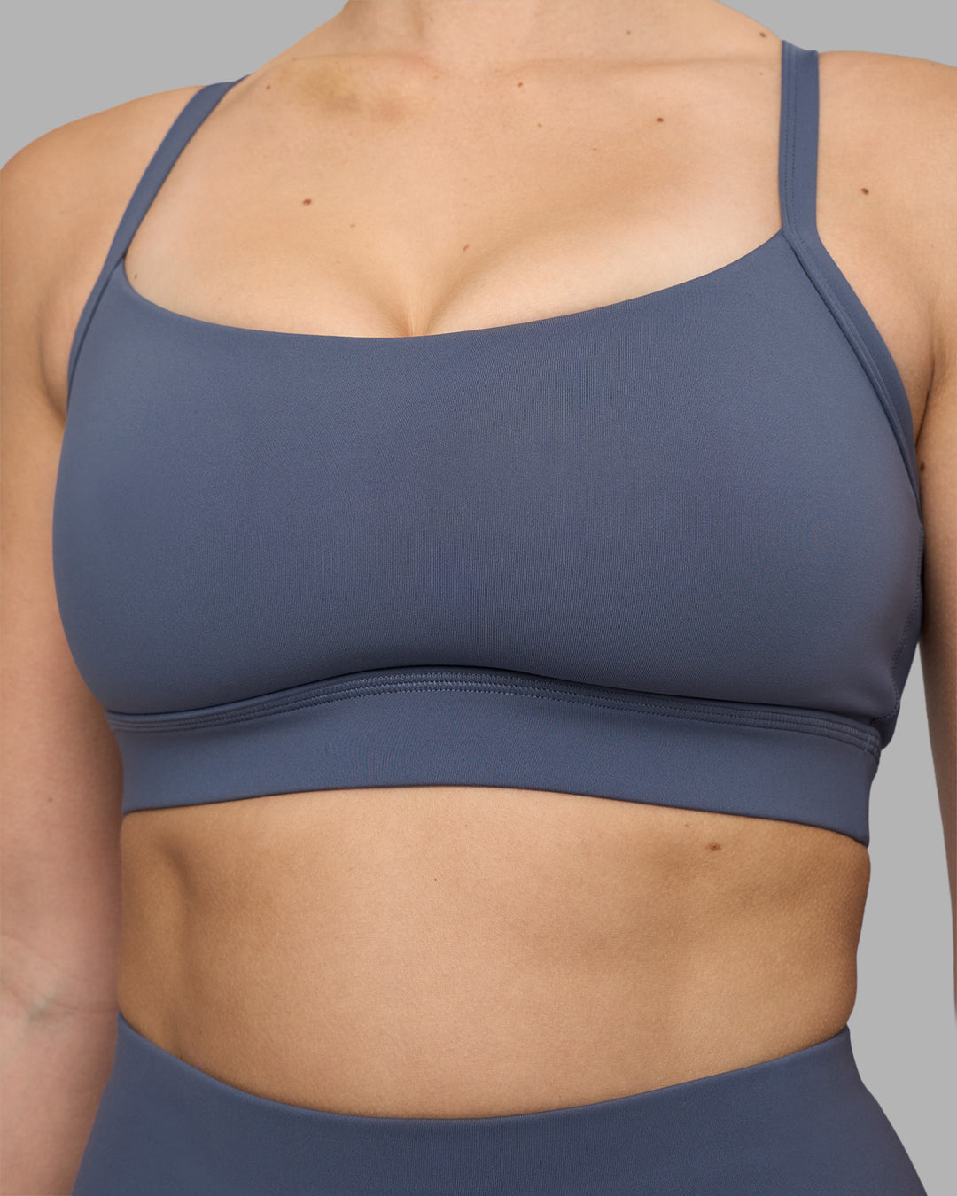 Woman wearing Momentum Sports Bra D/DD/E - Night Shadow | Model:Amy | Size:M - view 4