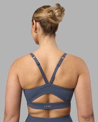 Woman wearing Momentum Sports Bra D/DD/E - Night Shadow | Model:Amy | Size:M | Thumbnail Index: 1
