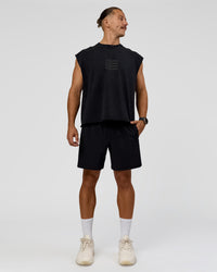 Man wearing Move Fast Heavyweight Boxed Tank - Black Washed | Model:Jaiden | Size:M | Thumbnail Index: 2
