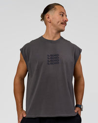 Man wearing Move Fast Heavyweight Boxed Tank - Dark Storm Washed | Model:Jaiden | Size:M | Thumbnail Index: 0