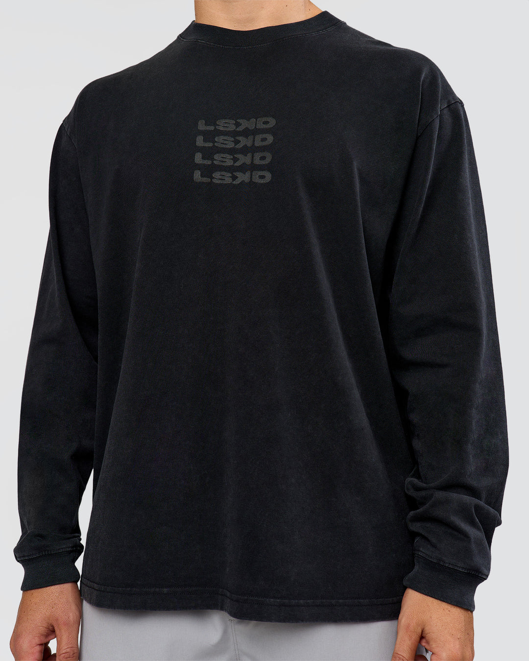 Man wearing Move Fast Heavyweight Oversized Long Sleeve Tee - Black Washed | Model:Jaiden | Size:M - view 7