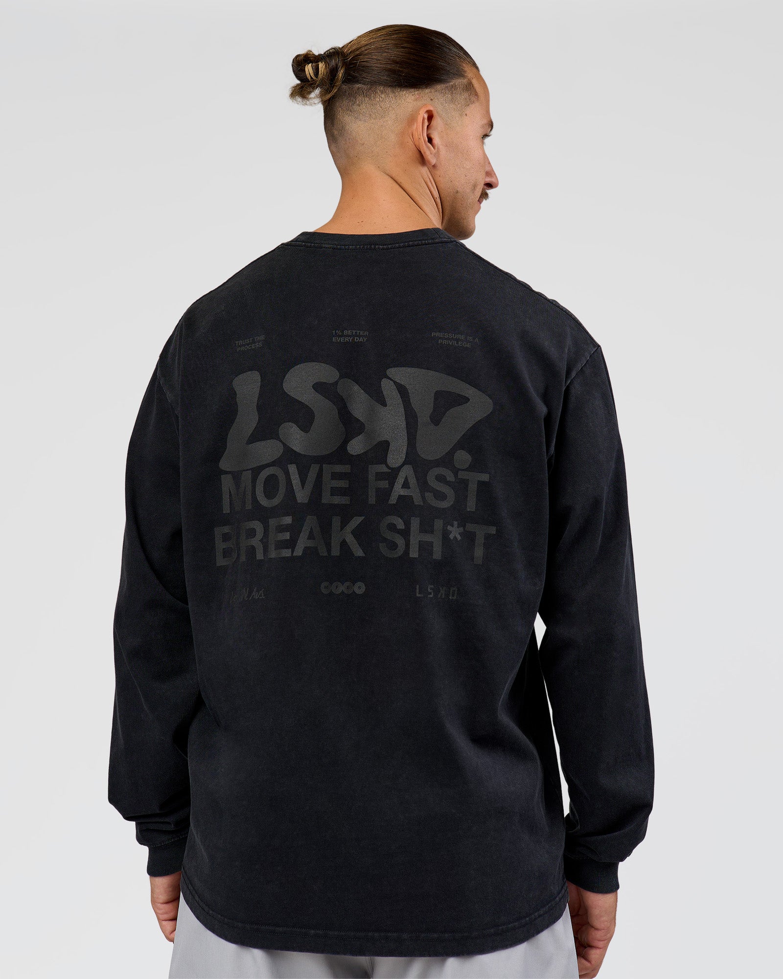 Man wearing Move Fast Heavyweight Oversized Long Sleeve Tee - Black Washed | Model:Jaiden | Size:M