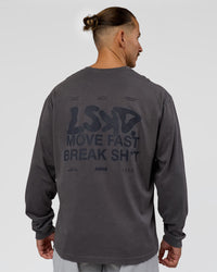 Man wearing Move Fast Heavyweight Oversized Long Sleeve Tee - Dark Storm Washed | Model:Jaiden | Size:M | Thumbnail Index: 1