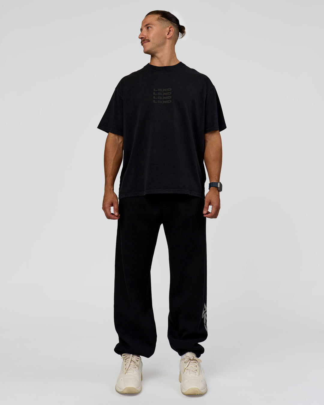 Man wearing Move Fast Heavyweight Oversized Tee - Black Washed | Model:Jaiden | Size:M - view 6