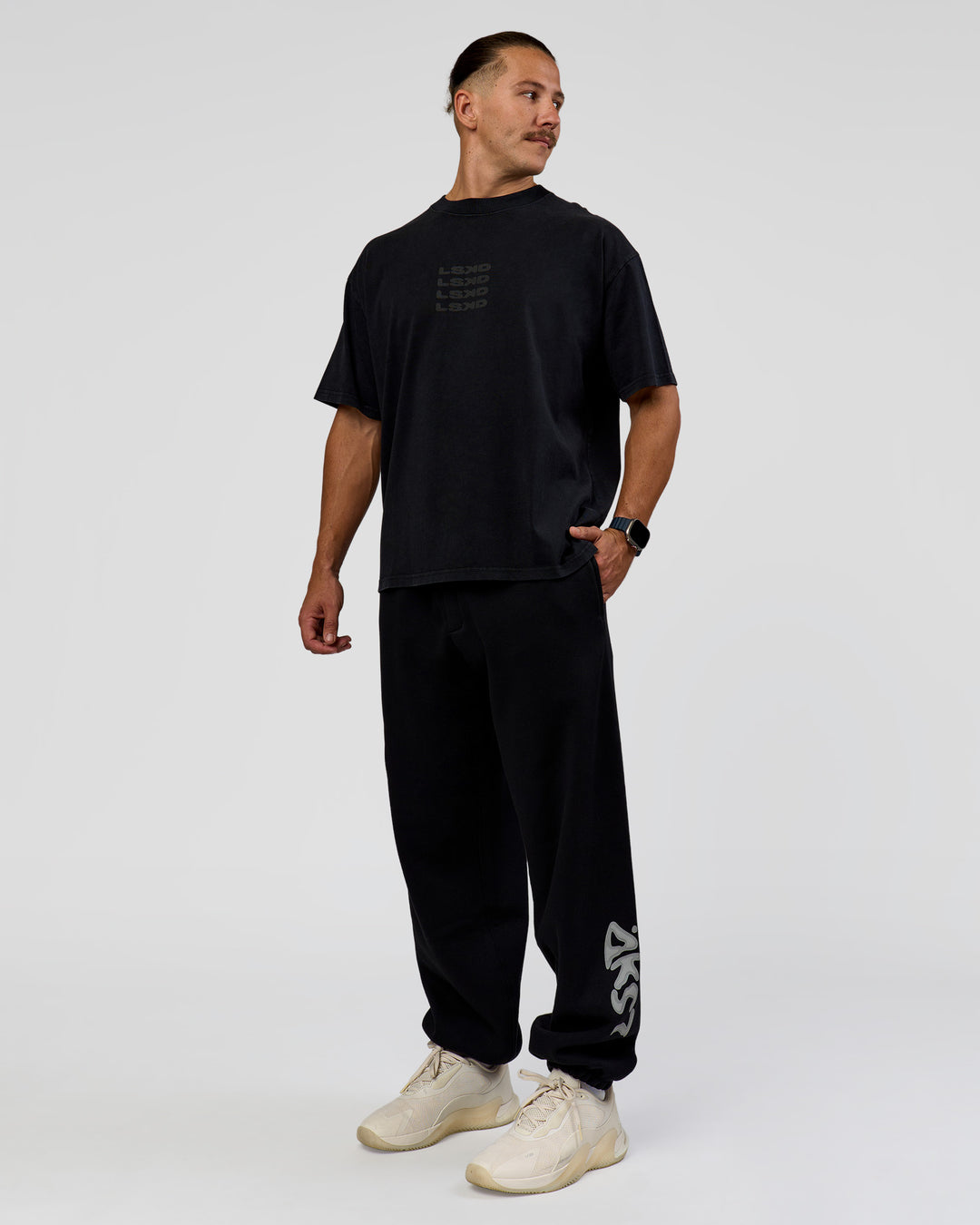 Man wearing Move Fast Heavyweight Oversized Tee - Black Washed | Model:Jaiden | Size:M - view 10