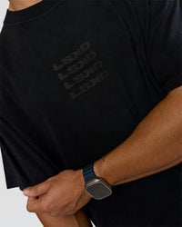 Man wearing Move Fast Heavyweight Oversized Tee - Black Washed | Model:Jaiden | Size:M | Thumbnail Index: 2