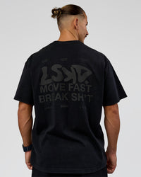 Man wearing Move Fast Heavyweight Oversized Tee - Black Washed | Model:Jaiden | Size:M | Thumbnail Index: 6
