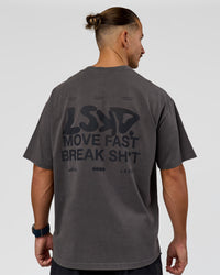 Man wearing Move Fast Heavyweight Oversized Tee - Dark Storm Washed | Model:Jaiden | Size:M | Thumbnail Index: 1