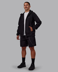Man wearing Nocturnal Oversized Zip Jacket - Black | Model:Jaiden | Size:M | Thumbnail Index: 1
