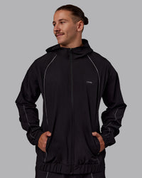 Man wearing Nocturnal Oversized Zip Jacket - Black | Model:Jaiden | Size:M | Thumbnail Index: 2