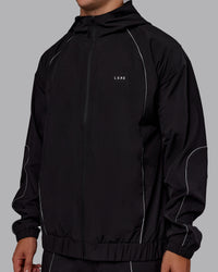 Man wearing Nocturnal Oversized Zip Jacket - Black | Model:Jaiden | Size:M | Thumbnail Index: 7