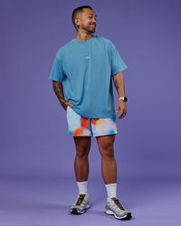 Man wearing Our Journey Heavyweight Oversized Tee - Azure Blue-Rainbow | Model:Justin | Size:M | Thumbnail Index: 8
