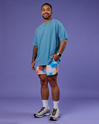 Man wearing Our Journey Heavyweight Oversized Tee - Azure Blue-Rainbow | Model:Justin | Size:M | Thumbnail Index: 4